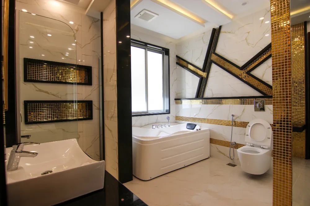 Bathroom technician repairing toilet plumbing – Pro Dallas Bathroom