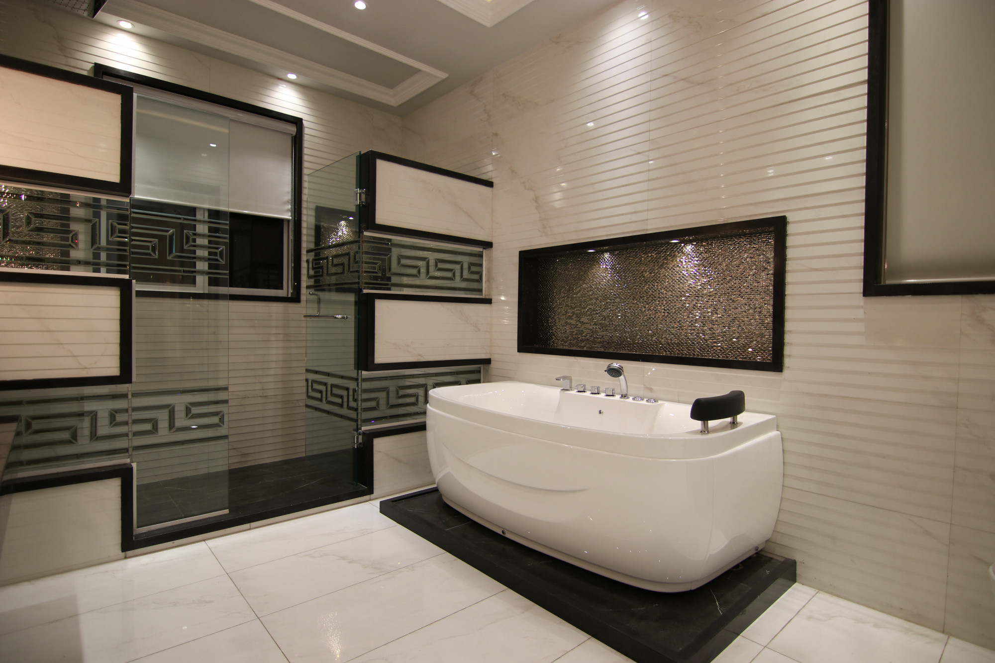 High-end bathroom with tiled walls and bathtub – Pro Dallas Bathroom